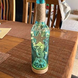 New in box Atlantis lighting believe wine bottle. Great for beach theme wedding.